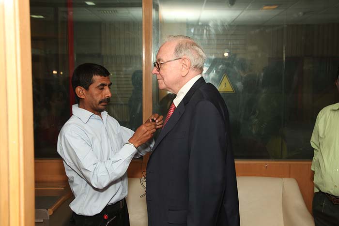 Warren Buffett being wired-up for a live discussion with some of the brightest students from across the country who came to listen to him at the NDTV studios.