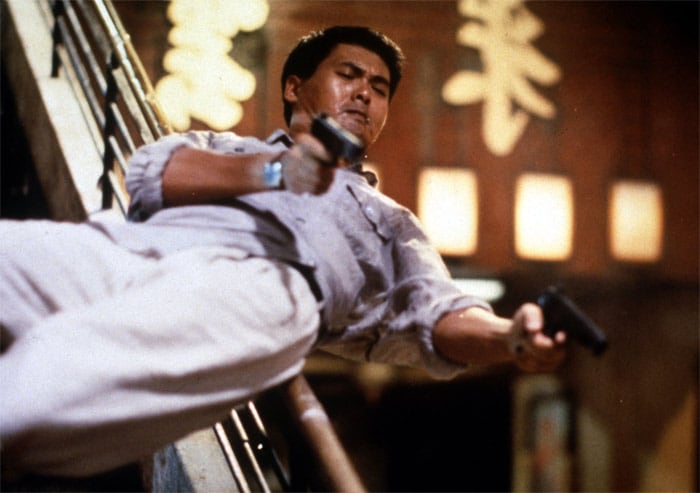 <b>Hard-Boiled</b> (1992): <b>Directed by</b> John Woo. <b>Starring</b>: Chow Yun-Fat, Tony Leung Chiu-Wai, Teresa Mo, Philip Kwok, Anthony Wong, Bowie Lam. <b>Memorable Quote</b>: "Give a guy a gun, he thinks he's Superman. Give him two and he thinks he's God." (Superintendant Pang)