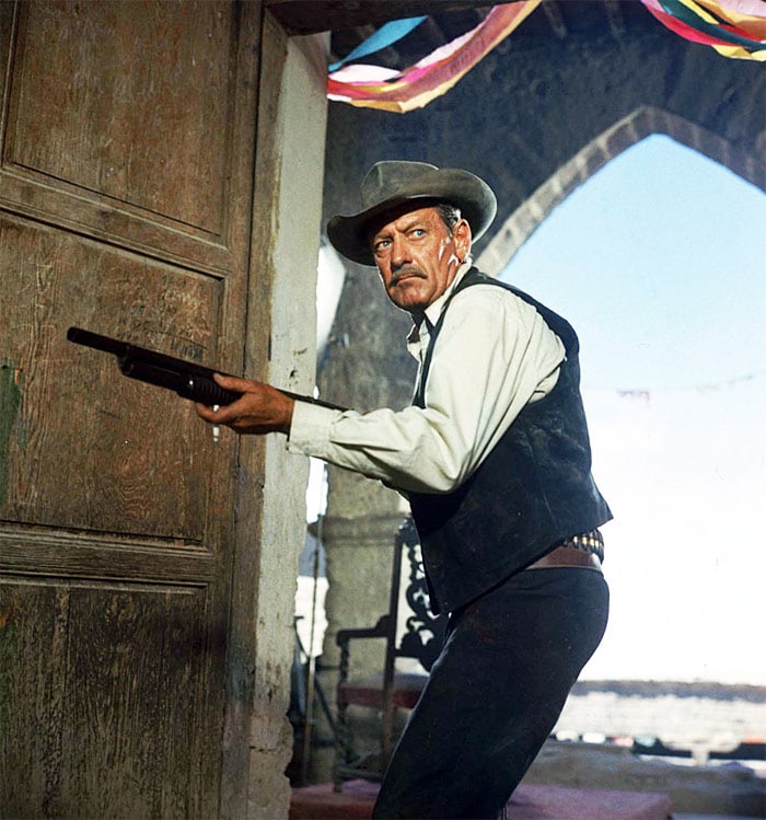 <b>The Wild Bunch</b> (1969): <b>Directed by</b> Sam Peckinpah. <b>Starring</b>: William Holden, Ernest Borgnine, Robert Ryan, Edmond O'Brien, Warren Oates, Jaime S�nchez, Ben Johnson. <b>Memorable Quote</b>: "Tell me, Mr. Harrigan, how does it feel? Getting paid for it? Getting paid to sit back and hire your killings... with the law's arms around you? How does it feel to be so goddamn right?" (Deke Thornton)