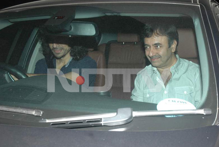 Director Imtiaz Ali drives into the venue with Rajkumar Hirani.