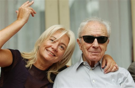 Italian movie director Michelangelo Antonioni poses with his wife Enrica Fico in Venice, Italy, Thursday, Sept 5, 2002,  at the 59th Venice Film Festival to receive the San Marco prize for his career.