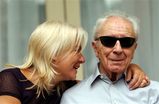 Antonioni poses with his wife Enrica Fico in Venice, Italy, on Sept 5, 2002.