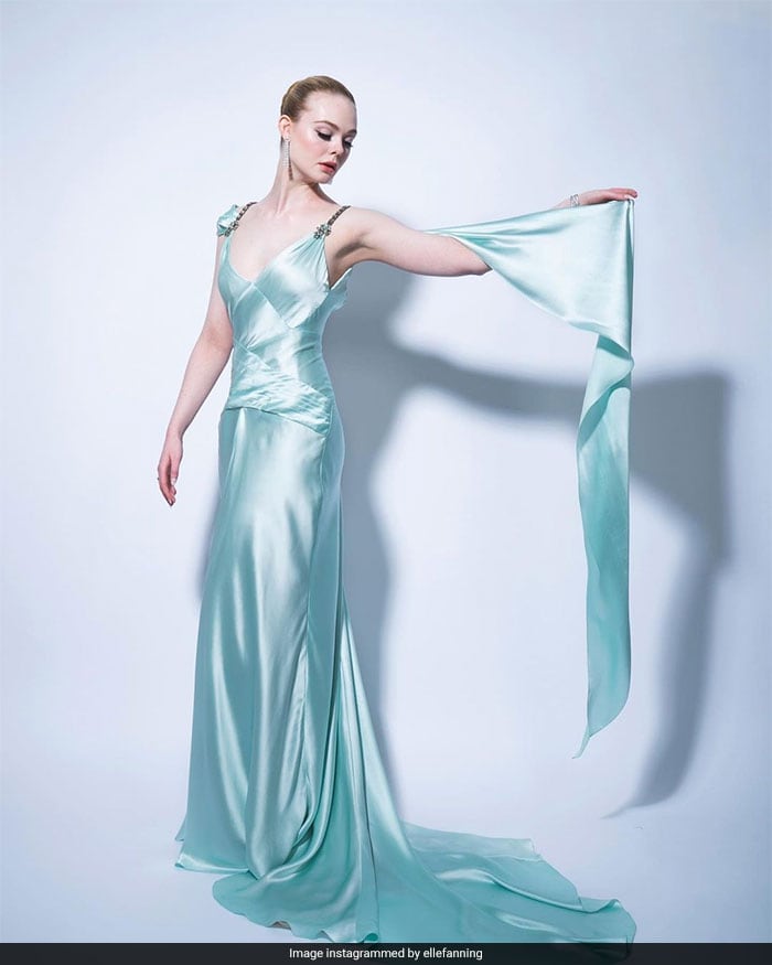 Elle Fanning, who was nominated for <I>The Great</i>, was ethereal in a silky blue gown. "Dressed up for a night in," she wrote. (courtesy <a href=" https://www.instagram.com/ellefanning/ " target="_blank" rel="nofollow" > ellefanning </a>)