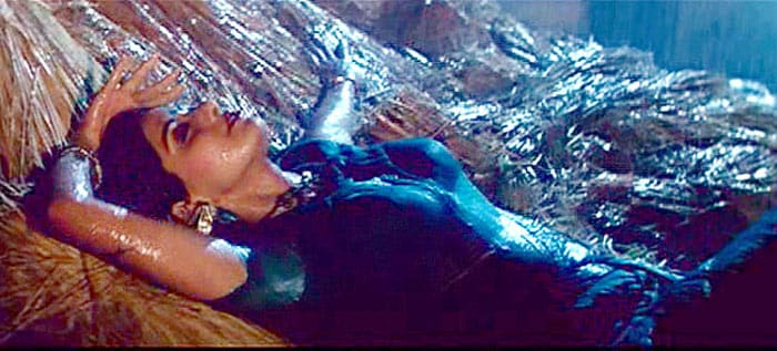 Sridevi has been something of a favourite when it comes to rain songs and saris. Her most famous rain dance was in <I>Mr India</i> in the song <I>Kaate nahi katatey</i>.