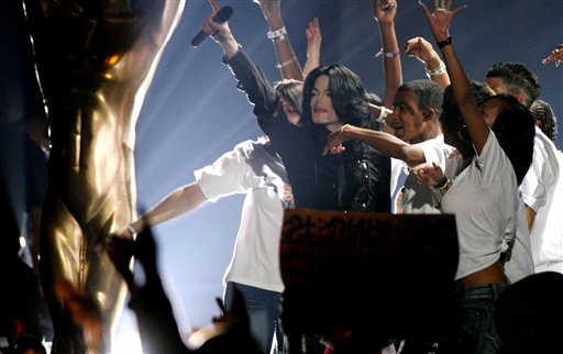 Michael Jackson performs We Are The World, on stage during the World Music Awards at Earls Court in central London.