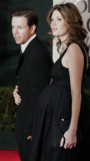 Entertainer Mark Wahlberg and his girlfriend, Rhea Durham, arrive for the 63rd Annual Golden Globe Awards.