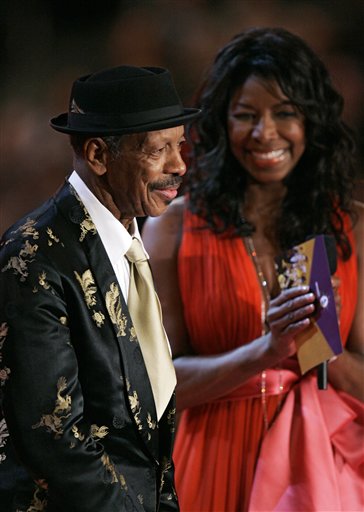 Natalie Cole and Ornette Coleman present the award for best new artist during the 49th Annual Grammy Awards