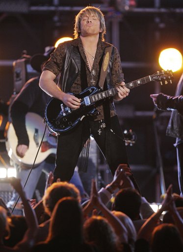 Joe Don Rooney, of the group Rascal Flatts, performs at the 49th Annual Grammy Awards