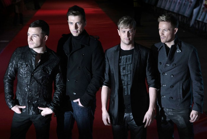 Irish boy band Westlife attend the UK premier of Michael Jackson's &quot;This Is It&quot; at the Odeon Cinema in Leicester Square in London on October 27, 2009. Four months after Jackson's sudden death, red carpets were rolled out for 18 simultaneous screenings on five continents for &quot;This Is It,&quot; a documentary culled from more than 100 hours of never-before-seen rehearsal footage. (Photo: AFP)