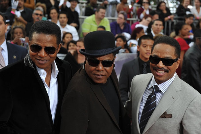 Michael Jackson's brothers, from left to right, Randy Jackson, Tito Jackson and Marlon Jackson, arrive for the world premiere of the Michael Jackson?s ?This is it? at the Noika Theatre at LA Live on October 27, 2009 in Los Angeles. (Photo: AFP)