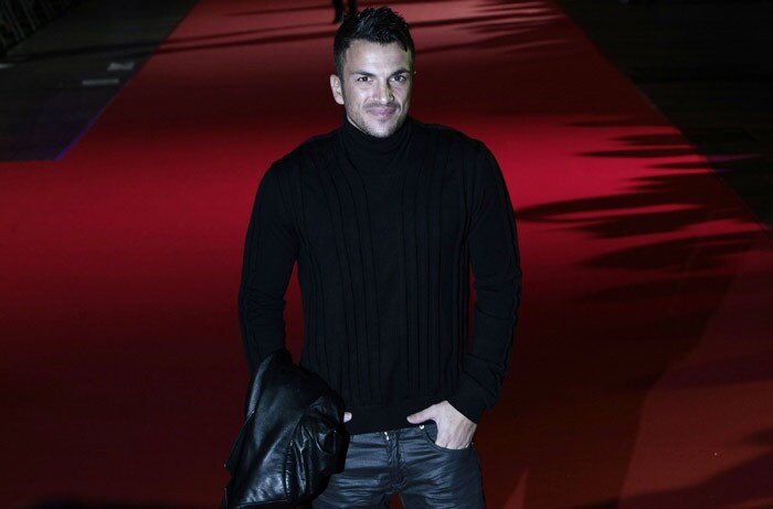 Australian pop star and former husband of British glamour model Katie Price, Peter Andre, attends the UK premier of Michael Jackson's <i>This Is It</i> at the Odeon Cinema in Leicester Square in London. Four months after Jackson's sudden death, red carpets were rolled out for 18 simultaneous screenings on five continents for <i>This Is It</i>, a documentary culled from more than 100 hours of never-before-seen rehearsal footage. (Photo: AFP)