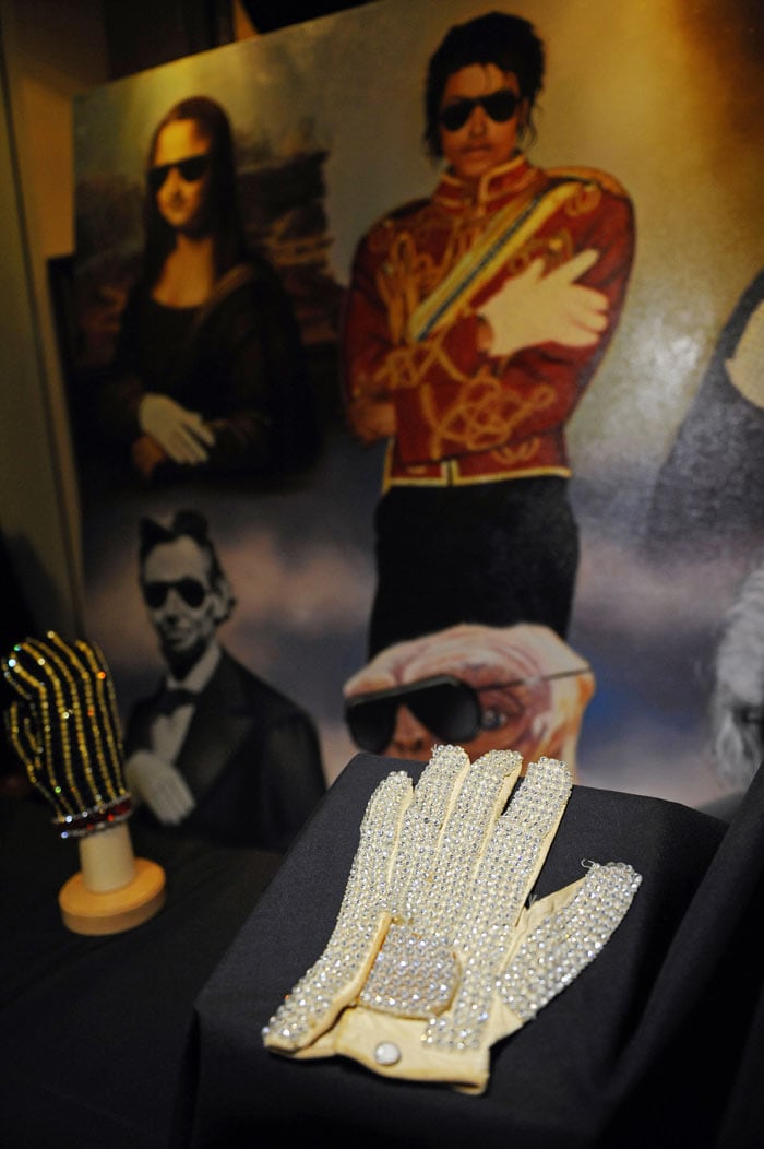 Michael Jackson's famous sequined white glove, worn at his first Moon Walk concert, went for $350,000 at an auction at Hard Rock cafe in New York City. (Photo: AFP)