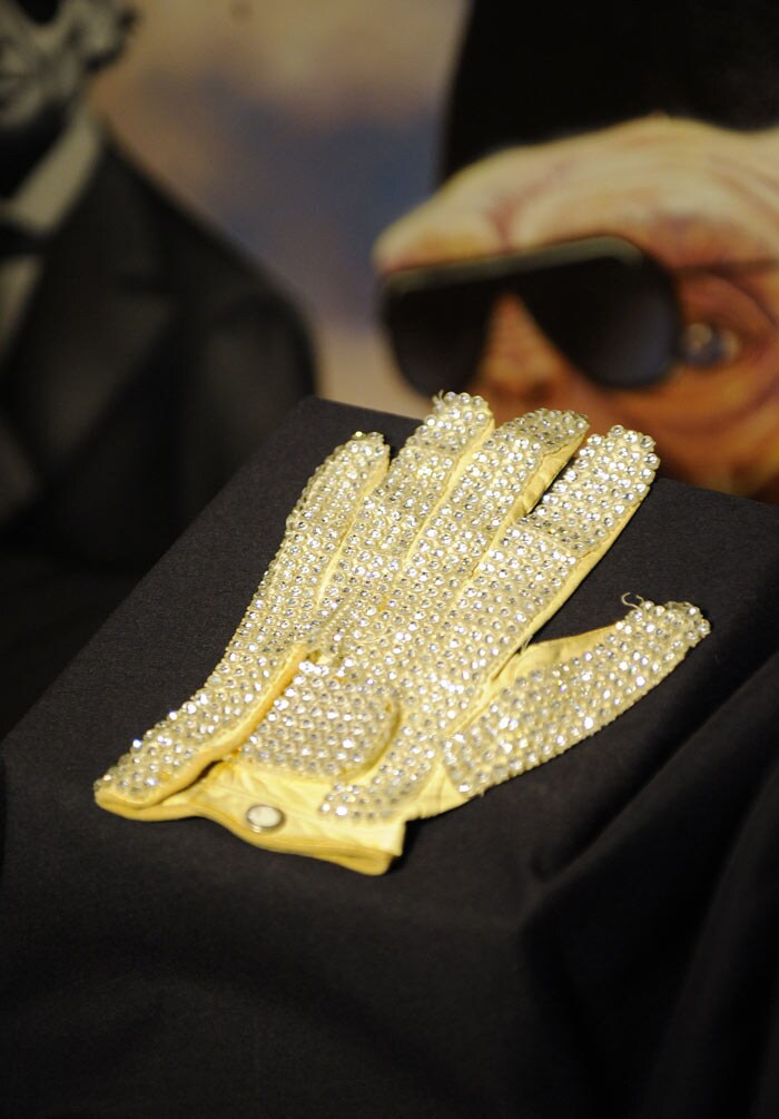 A similar white glove, which the icon wore on his 1984 Victory tour, sold for a staggering USD 66,000 in October. (Photo: AFP)