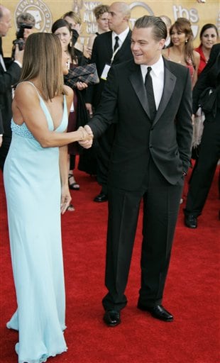 Leonardo DiCaprio, right, greets Vanessa Williams as they arrive at the 13th Annual Screen Actors Guild Awards.