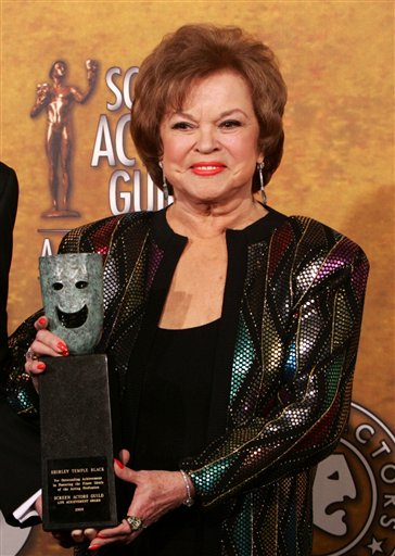 Shirley Temple Black poses with the Screen Actors Guild Awards annual life achievement award at the 12th Annual Screen Actors Guild Awards.