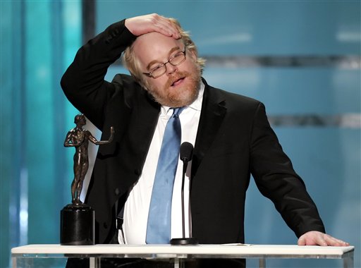 Philip Seymour Hoffman accepts the award for outstanding performance by a male actor in a leading role for his work in Capote, at the 12th Annual Screen Actors Guild Awards.