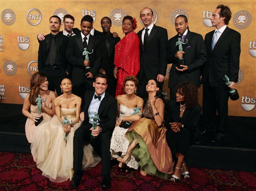 Cast members pose with the award for outstanding performance by a cast in a motion picture for their work in Crash, at the 12th Annual Screen Actors Guild Awards.