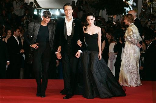 Italian actress Asia Argento, left, actor Fu'ad Ait Aattou, center, and actress Roxanne Mesquida arrive for the screening of the film Une Vieille Maitresse, at the 60th International film festival in Cannes.