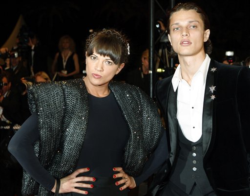 Italian actress Asia Argento, left, and Fu'ad Ait Aattou arrive for the screening of the film Une Vieille Maitresse, at the 60th International film festival in Cannes.