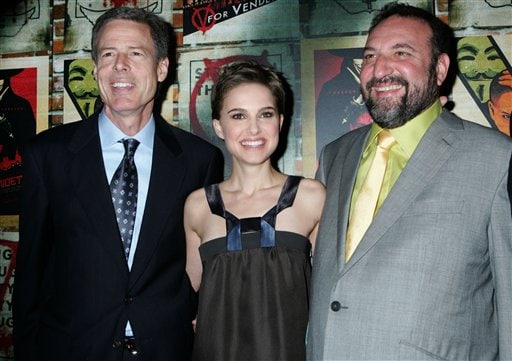 Natalie Portman, center, poses with Jeff Bewkes, left, President and COO of Time Warner, Inc., and producer Joel Silver, right, at the premiere of V for Vendetta