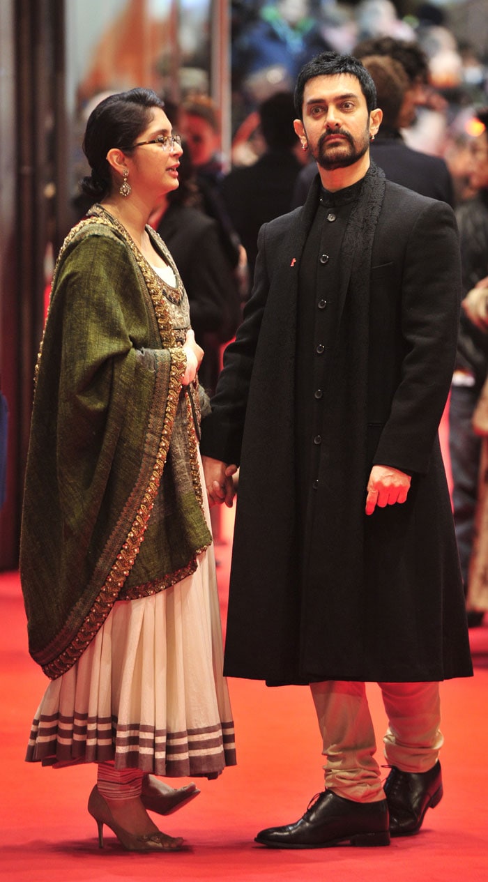 Bollywood star Aamir Khan, who is a part of the seven-person jury at the 61st Berlin film festival, arrive for the premiere of the film True Grit with his wife Kiran Rao in Berlin. The Berlinale film festival takes place from February 10-20, 2011. (Photo: AFP)