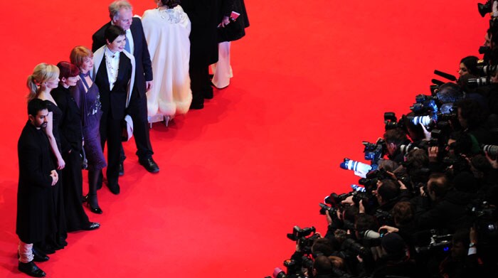 Members of the jury (from L) Bollywood actor Aamir Khan, German actress Nina Hoss, British costume designer Sandy Powell, Australian producer Jan Chapman, Italian actress and jury president Isabella Rossellini and Canadian producer Guy Maddin arrive on the red carpet for the premiere of the film <I>True Grit</I> in Berlin. (Photo: AFP)