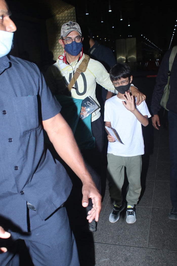 While heading out, Aamir and his son were escorted by security guards.