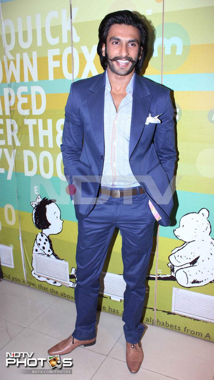 Actor Ranveer Singh was at the launch of Men's Health book in Mumbai. He's posed shirtless for the cover of Men's Health magazine's December issue.