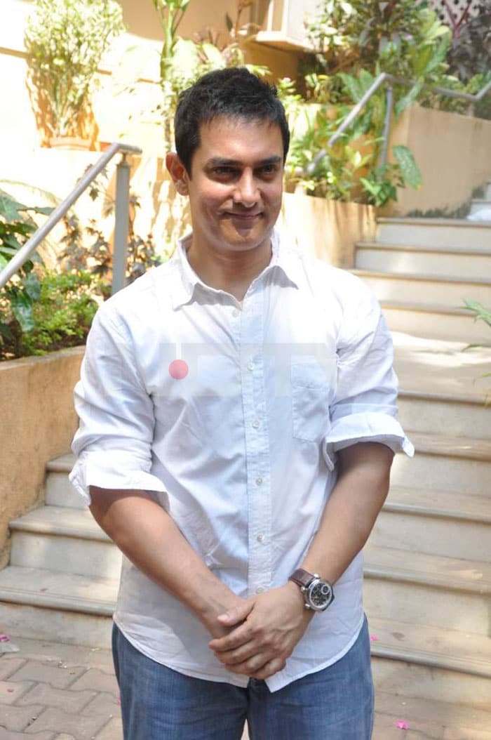 Aamir Khan poses for the shutterbugs.