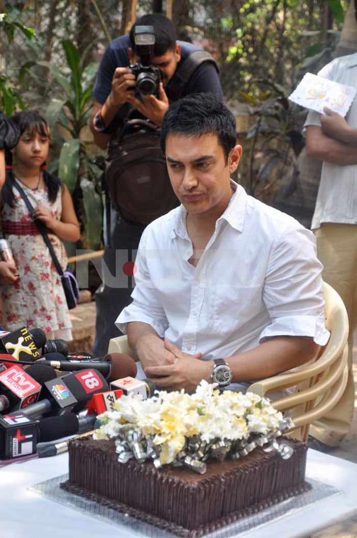 Aamir Khan interacts with the media.