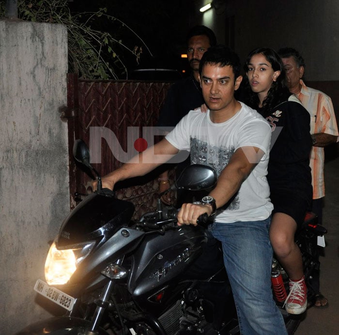 Aamir Khan takes his daughter Ira for a ride on his bike to celebrate his birthday.