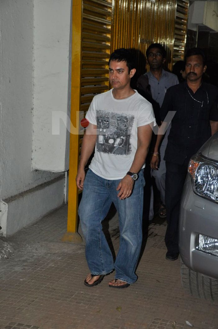 Aamir Khan walks out of his residence in Mumbai.