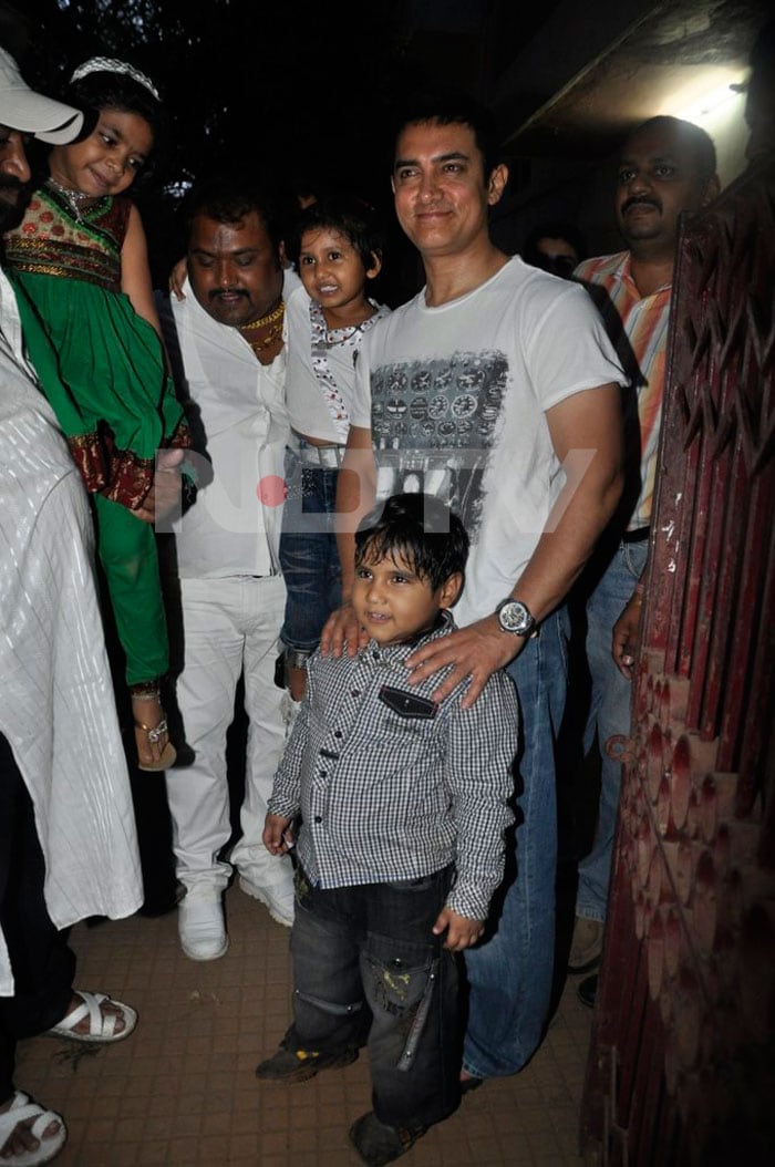 Aamir with a young fan of his.