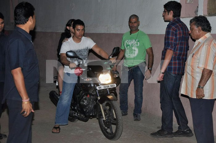 Aamir Khan takes his daughter Ira for a ride on his bike.