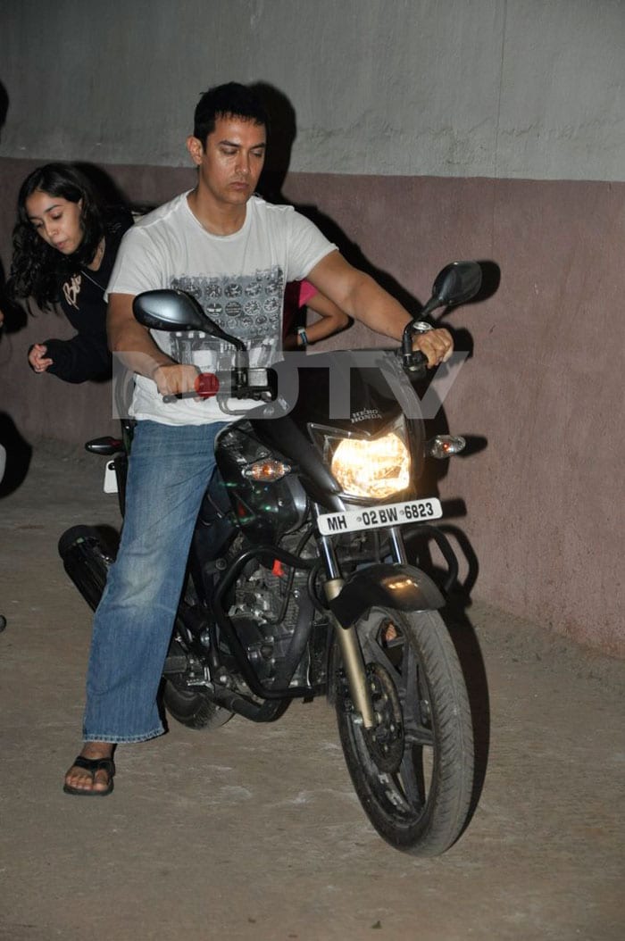 Aamir Khan takes his daughter Ira for a ride on his bike.