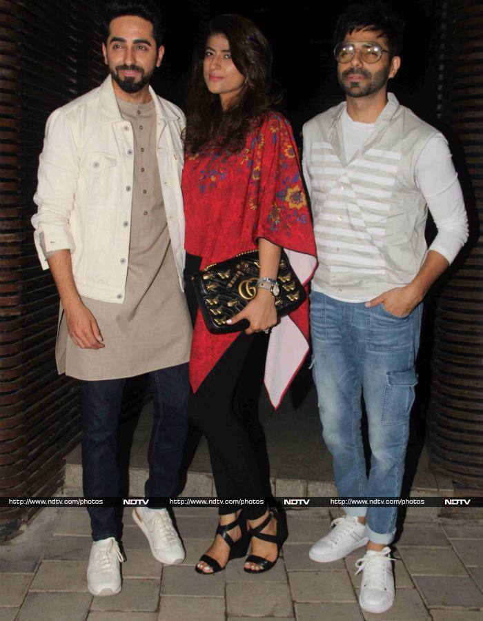 Ayushmann Khurrana stopped for pictures with his wife Tahira and brother Aparshakti.