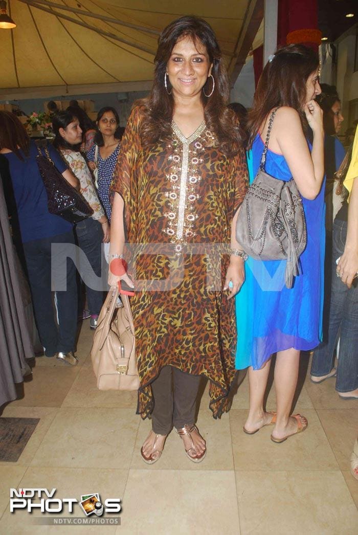 Socialite Sharmilla Khanna in an animal print Kaftan dress.