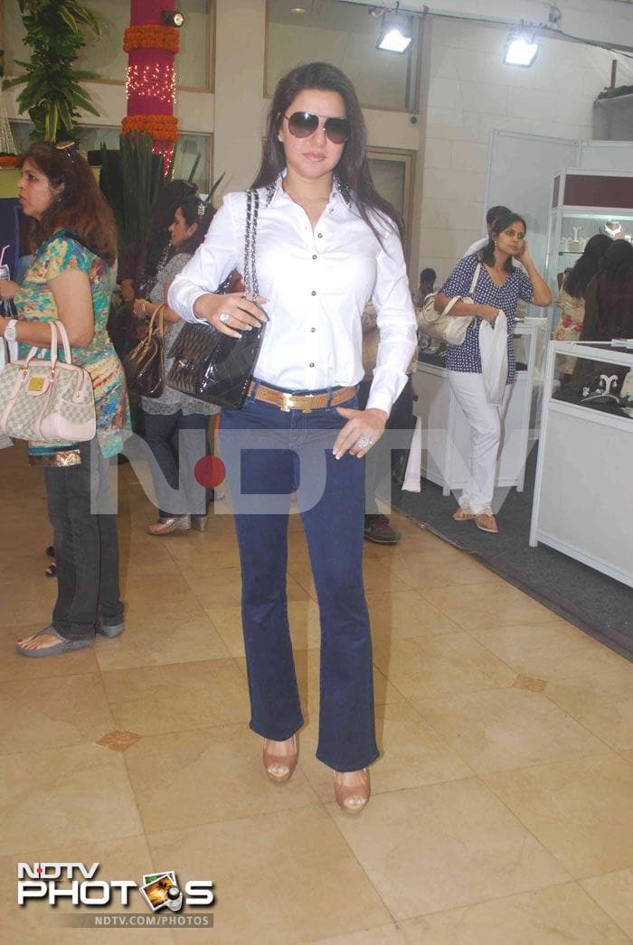 Kahkashan Patel is impressive in blue jeans and white top. We like her nude peep-toes.