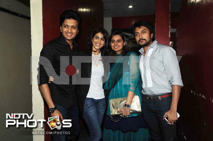 The Deshmukhs' family album: Genelia and Riteish pose with his elder brother Dhiraj and his wife Honey.