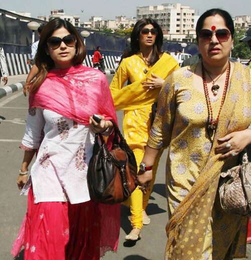 Actress Shilpa Shetty (in yellow) has always been very close to her mother Sunanda who famously said about Shilpa's participation in <I>Big Brother</i> that before that Shilpa had never travelled anywhere without her.