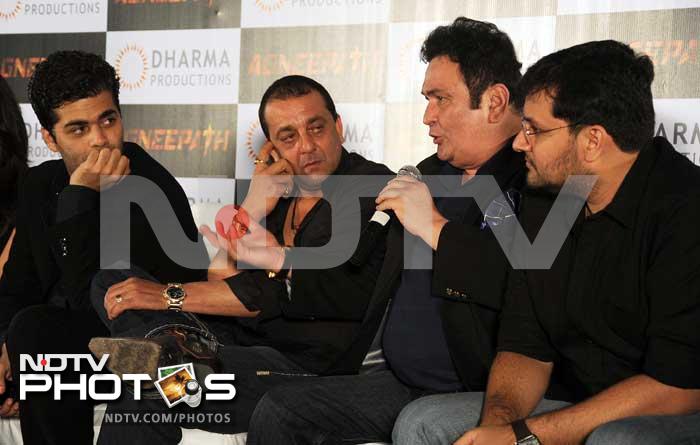 Rishi Kapoor, who has been widely appreciated in his negative role as Rauf Lala, answers the questions while Karan Johar, Sanjay Dutt and Karan Malhotra listen carefully.