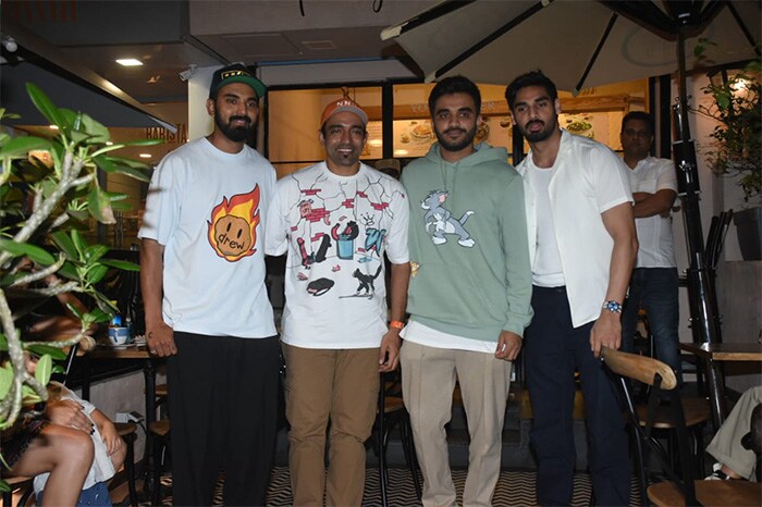 Ahan Shetty and KL Rahul also posed with Robin Uthappa, who attended the launch event with his wife Sheethal Goutham, at the launch of a cafe in Mumbai.