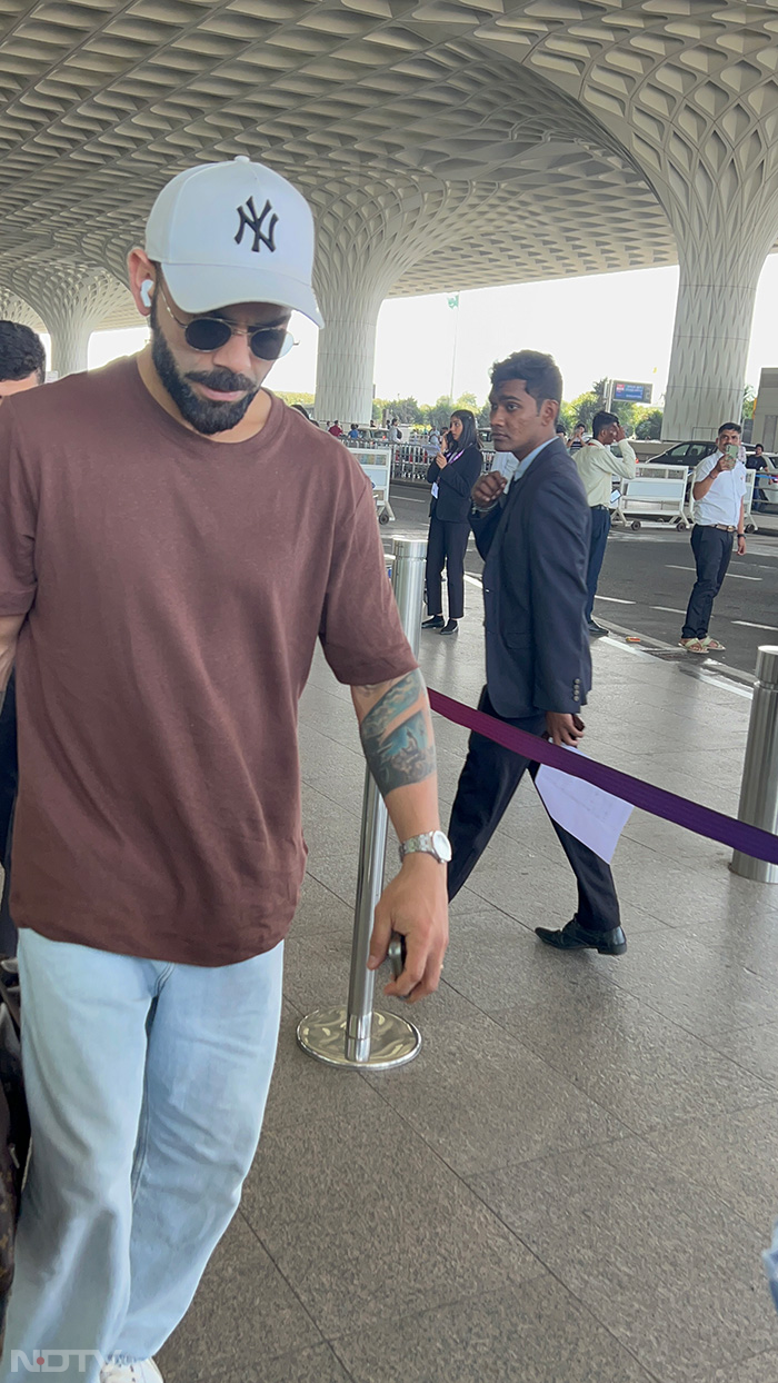 Virat Kohli's swag was off the charts as he was clicked at the airport. (Image courtesy: Varinder Chawla)