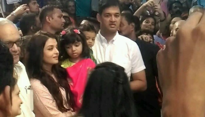 The Rais posed for pictures as visitors became citizen-paparazzi.  <br><br>This image was posted on Facebook by <a href=" https://www.facebook.com/AishwariyaRaiBachchan/?ref=page_internal" target="_blank" rel="nofollow" >Aishwarya Rai Bachchan</a>