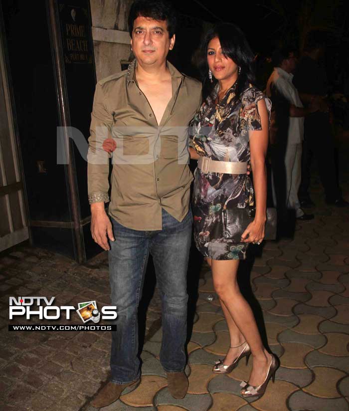 Sajid Nadiadwala and his wife Wardha Khan pose for shutterbugs.