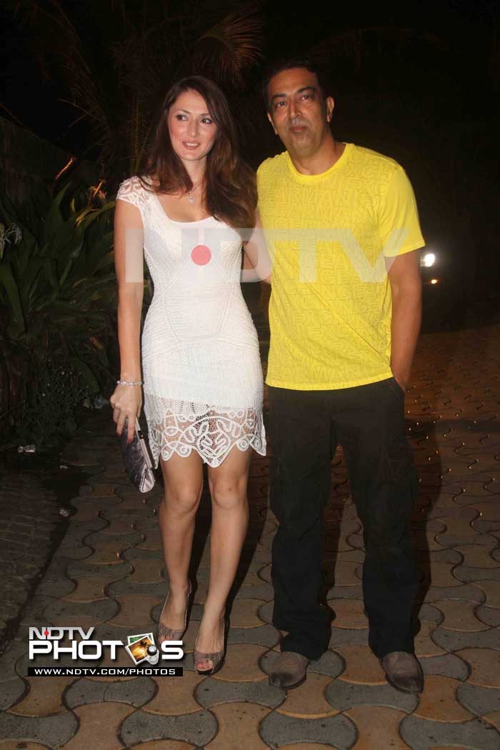 The uber-casual Vindu Dara Singh walks in with his lovely wife Dina.