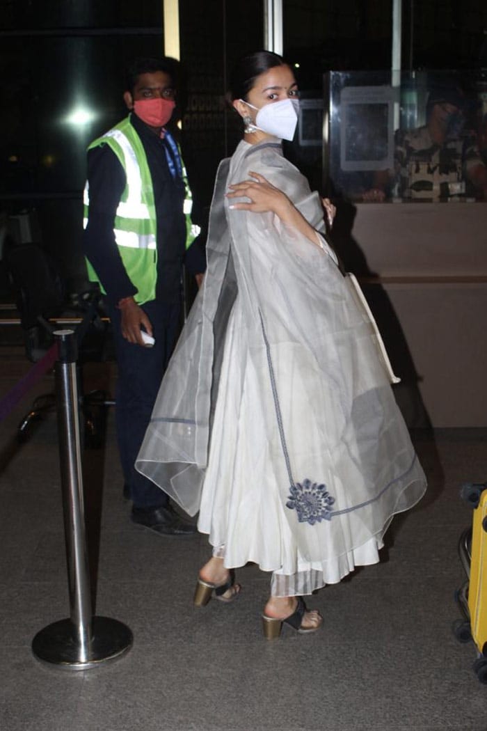 Alia Bhatt was photographed in a white anarkali at the Mumbai airport.