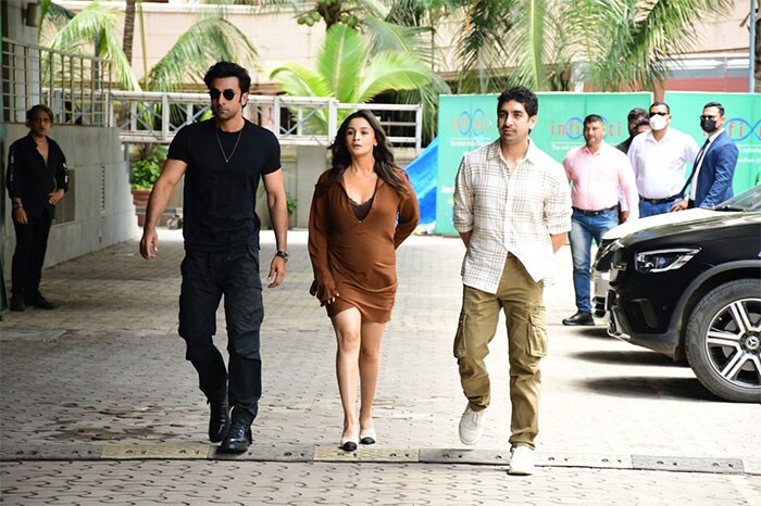 Alia Bhatt and Ranbir Kapoor were pictured with <i>Brahmastra</i> director Ayan Mukerji at the event.