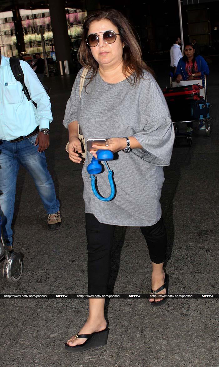 Filmmaker Farah Khan's travel companion was a pair of headphones.