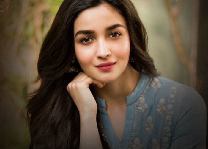 Alia Bhatt will also be seen in SS Rajamouli's upcoming film <I>RRR</i>, the cast of which is headlined by Ram Charan and Jr NTR. <br><br>This image was posted on Twitter by <a href=" https://twitter.com/RRRMovie/status/1106076566591758336" target="_blank" rel="nofollow" >RRR Movie</a>